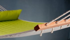 Green Padded Hammock with spreader bar